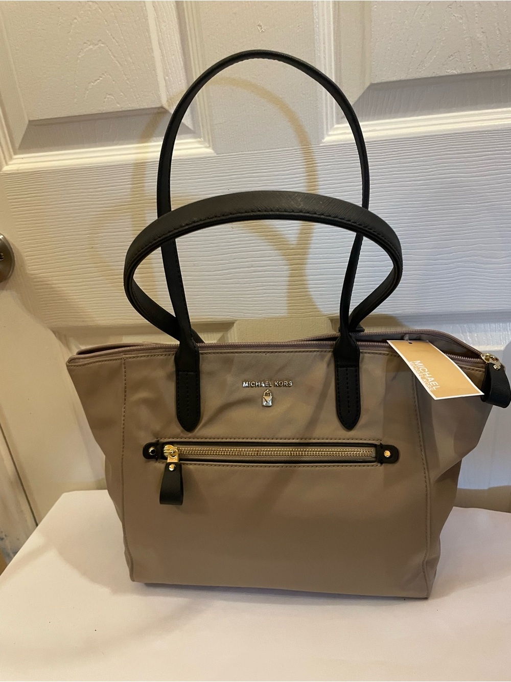 Michael Kors Taupe Tote with Black Handles and Gold Hardware